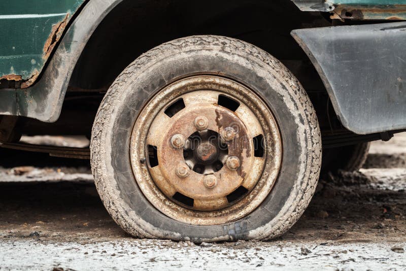 Rusted wheel of old car royalty free stock images
