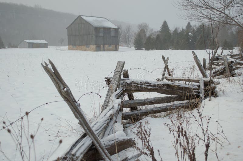 Rustic Barn And Fence In Winter Stock Image - Image of 