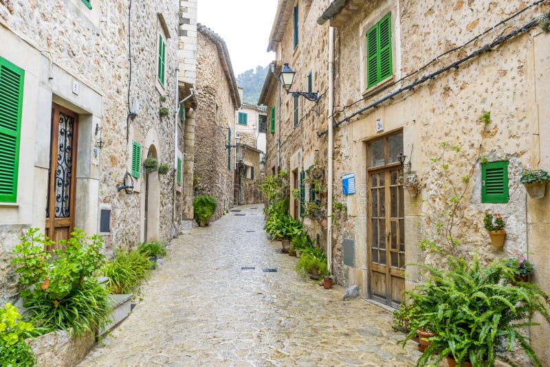 rustic, flowerpots street in the tourist island of Mallorca, Val