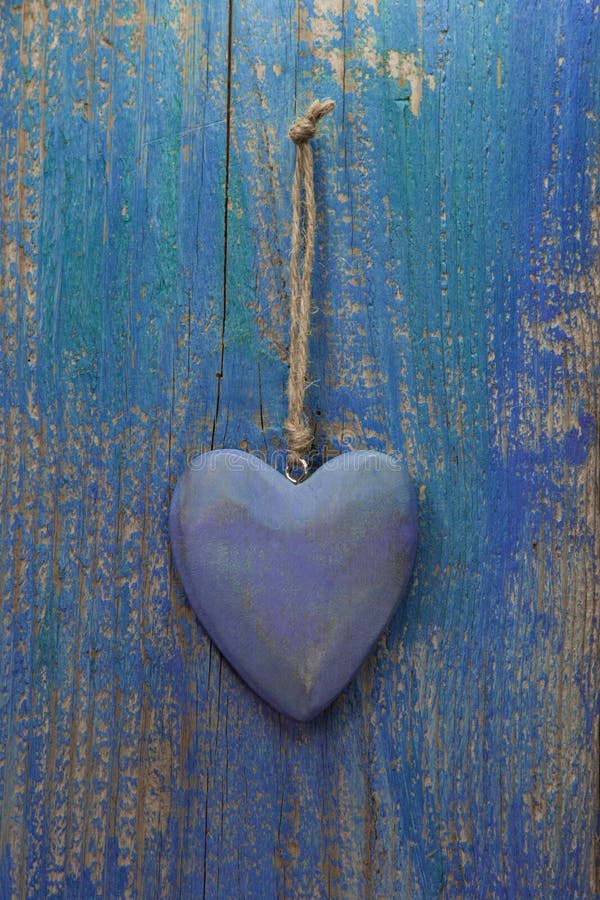Rustic heart on turquoise/blue wooden surface for valentine, bir royalty free stock image Rustic heart on turquoise/blue wooden surface for valentine, bir royalty free stock image