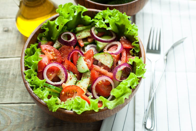 Rustic Salad of Fresh Tomatoes, Cucumbers, Red Onions and Lettuce ...