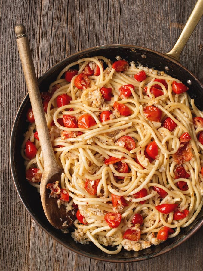Rustic Spicy Italian Crab and Cherry Tomato Spaghetti Pasta Stock Image