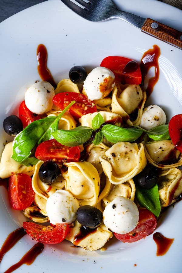 Rustic Tortellini Pasta Salad with Mozzarella Stock Photo - Image of ... Rustic Tortellini Pasta Salad with Mozzarella Stock Photo - Image of ...