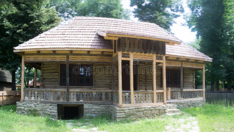 Renovated romanian traditional old house in National Village Museum, Bucharest, Romania. Renovated romanian traditional old house in National Village Museum, Bucharest, Romania.