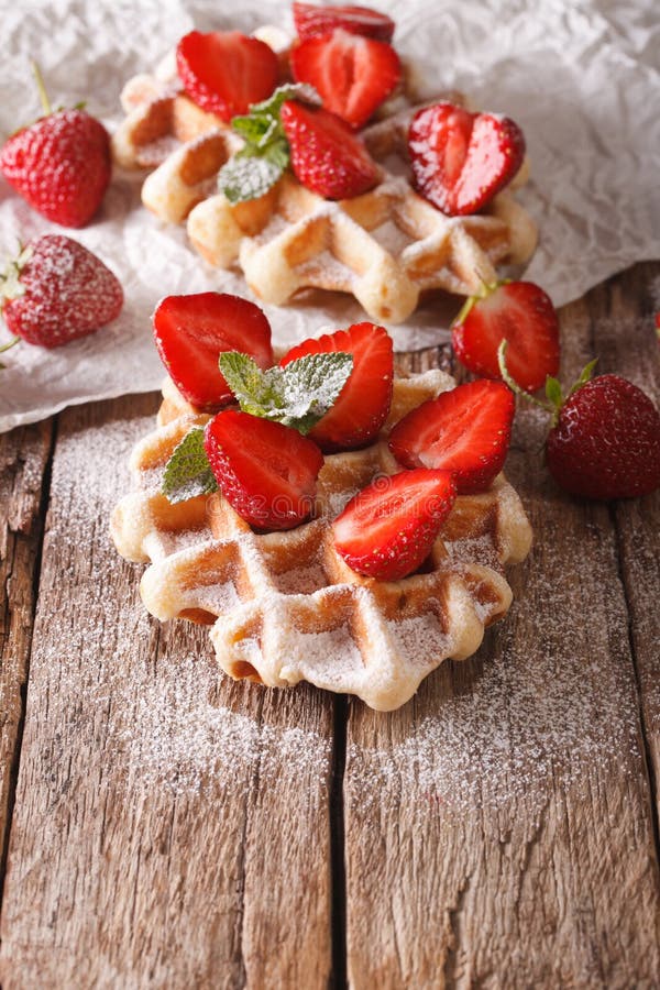 Rustic Waffles with Strawberries, Powdered Sugar and Mint Closeup. Vertical Stock Image Image