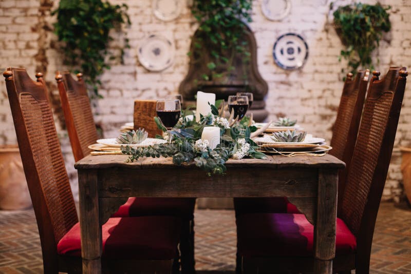 A Table Setting Designed for an Intimate Boho Style Event with Rustic Touches and Red Velvet Chair Stock Photo - Image of dinner, boho: 178121532 A Table Setting Designed For An Intimate Boho Style Event With Rustic Touches And Red Velvet Chair Stock Photo - Image Of Dinner, Boho: 178121532