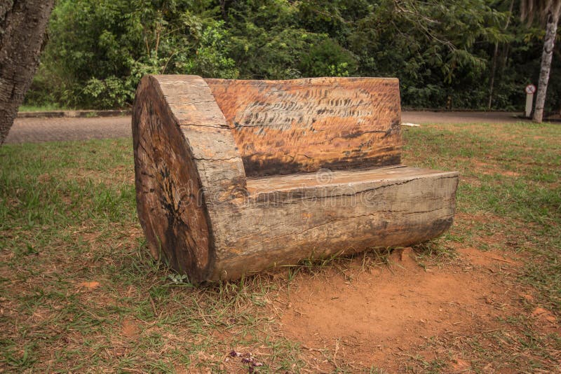 Rustic Wooden Trunk Bench stock photo. Image of plant 91815184