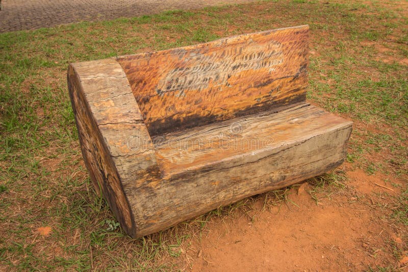 Rustic Wooden Trunk Bench stock photo. Image of color 91815314