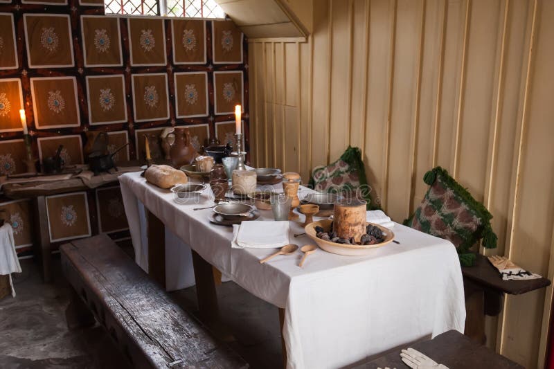 Interior of an old country house with table set for a breakfast. Interior of an old country house with table set for a breakfast.