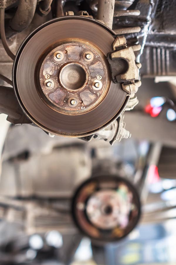 Rusty Brake Disc waiting for Maintenance in Service Garage stock image
