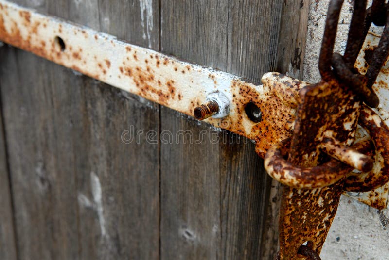 An old door hinge at farm. An old door hinge at farm