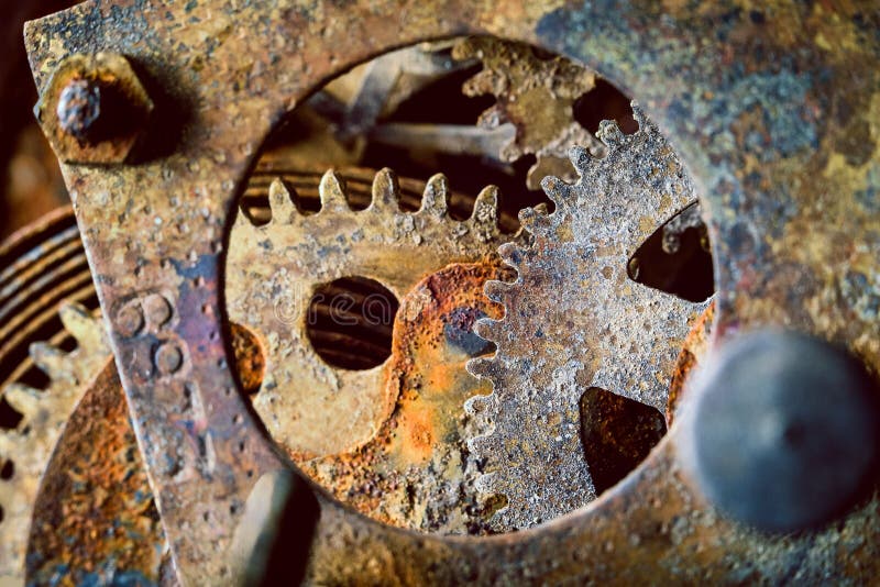 Rusty gears. Rusty and old watch gears close up Rusty gears. Rusty and old watch gears close up