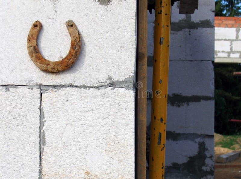An Old Horseshoe on a Red Wall Stock Photo Image of antique, cowboy