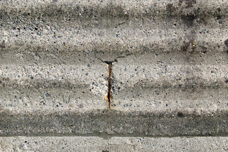 Rusty Iron Reinforcing Bar Emerging from an Old Concrete Wall Stock Photo Image of metal