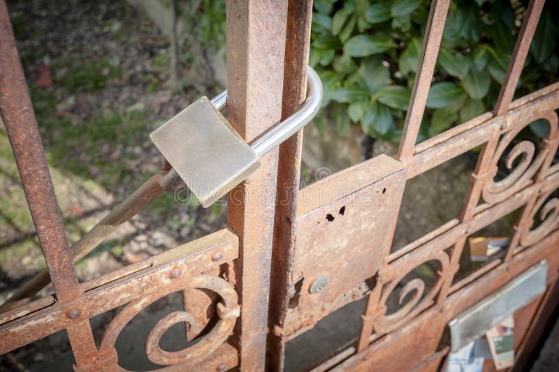 Rusty Metal Gate Closed with Padlock Stock Photo Image of rusty