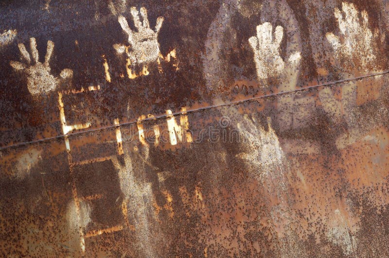 Rusty metal with handprint