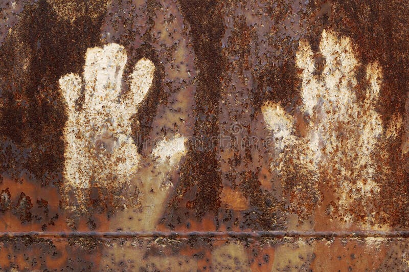 Rusty metal with handprint