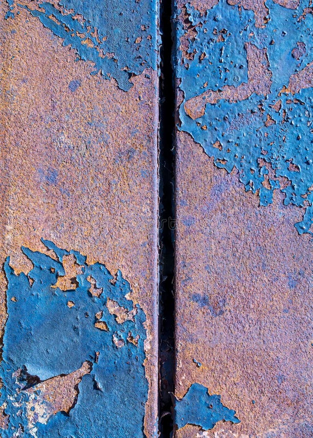 Rusty metal plates with grunge, pealing off blue paint