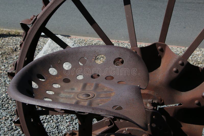 Rusty Tractor Seat stock image. Image of agriculture 229426515