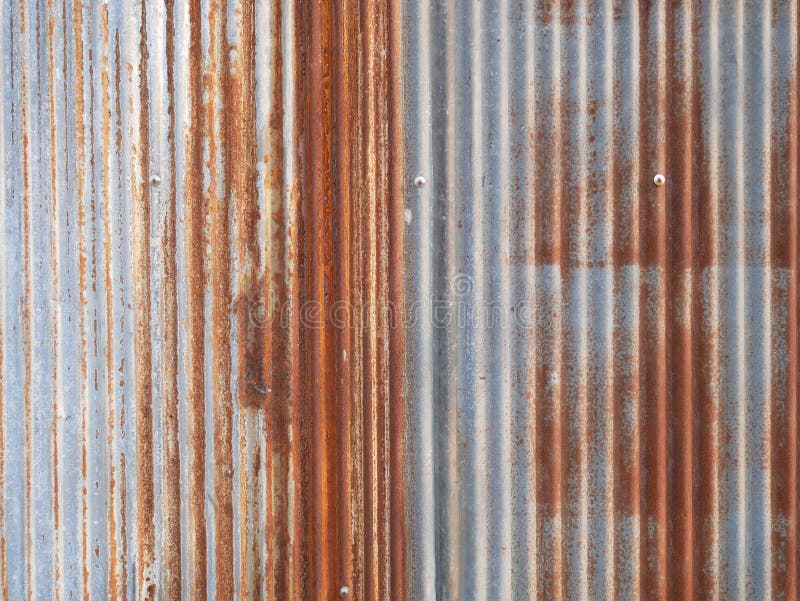 Rusty metal wall background, old zinc roof texture