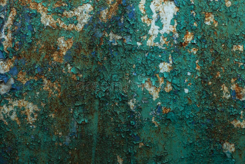 Rusty Metal Wall, Old Iron Sheet, Covered With Rust With Multicolored Paint. Trace Of Remnant