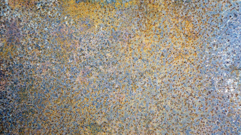 Rusty metal wall texture background, old sheet of iron covered with rust