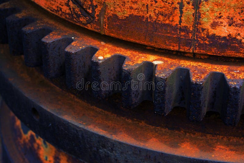 Rusty and metallic gear wheel stock photography