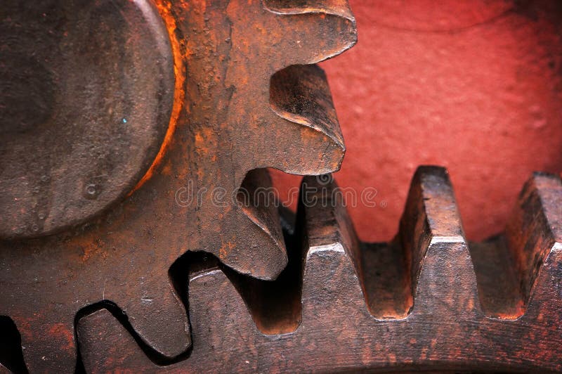 Rusty and metallic gear wheel stock photography