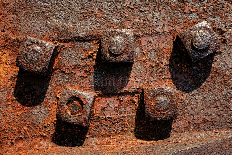 Rusty Nuts antique sur les boulons industriels en métal de rouille image libre de droits Rusty Nuts antique sur les boulons industriels en métal de rouille image libre de droits