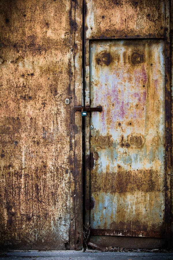 Rusty old brown metal door stock image. Image of grungy 28547223