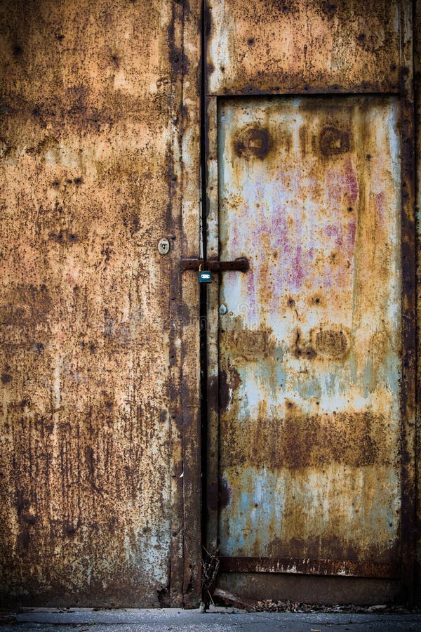 Rusty old brown metal door stock image. Image of grungy - 28547223
