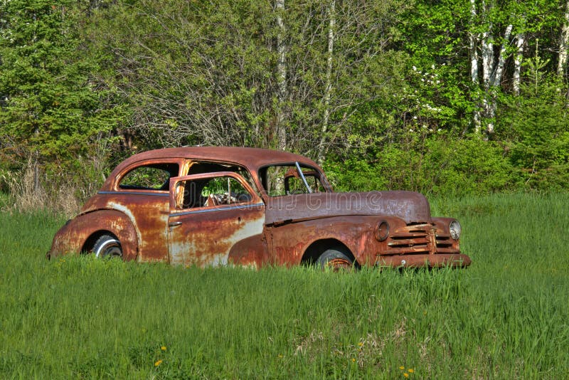 HDR Photo. Old Car Sitting in a Field with Evergreen Background and Foliage  . Car Old in HDR Photo. HDR Image. HDR Photo. HDR Stock Photo - Image of  rusty, phcar: 167521490