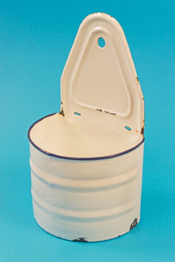 Rusty Old Salt Container for Wall Isolated on Blue Stock Image Image