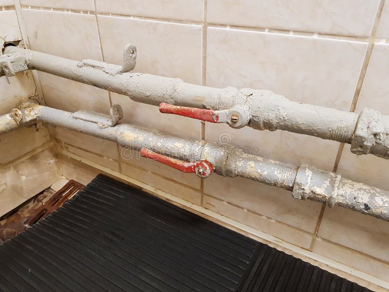 Rusty Pipe in the Shower Room. Garbage Can Clog the Pipe in the
