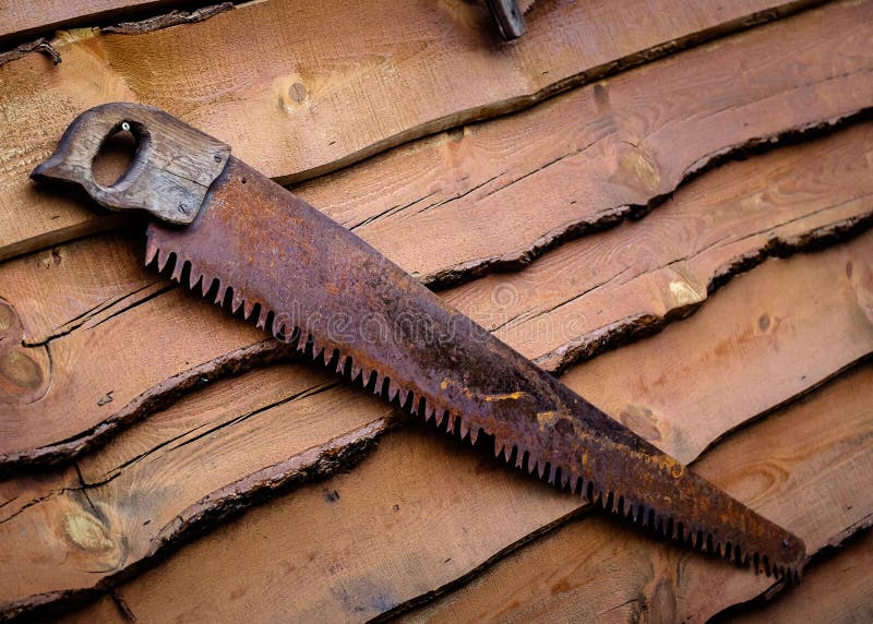 Rusty saw on wall stock image. Image of dark, timber 95622757