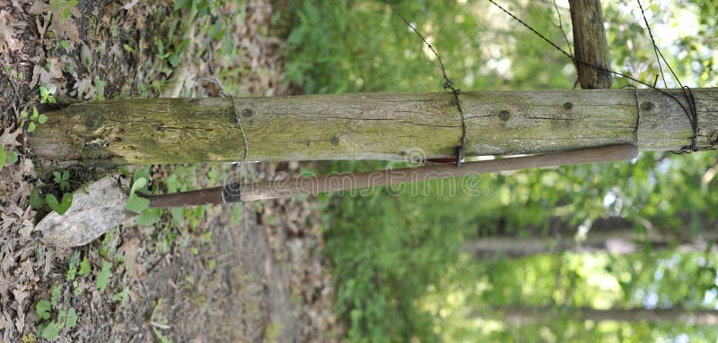 Rusty Shovel Leaning On Post