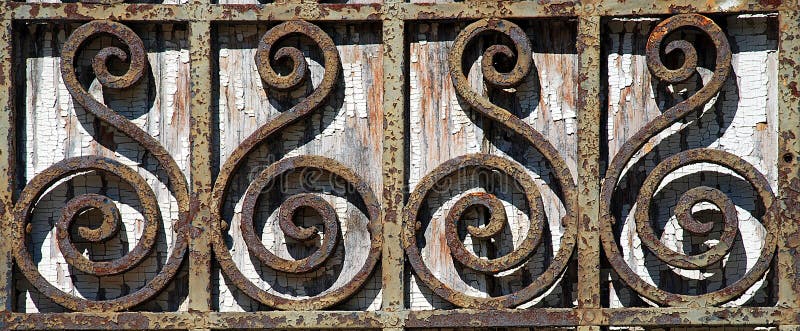 Rusty Wrought Iron Fence Detail