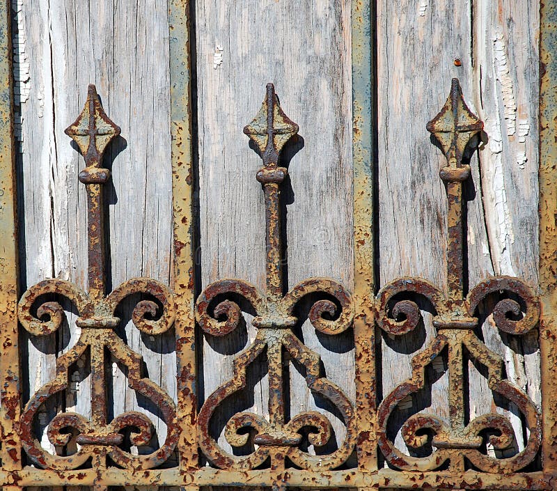 Rusty Wrought Iron Fence Detail