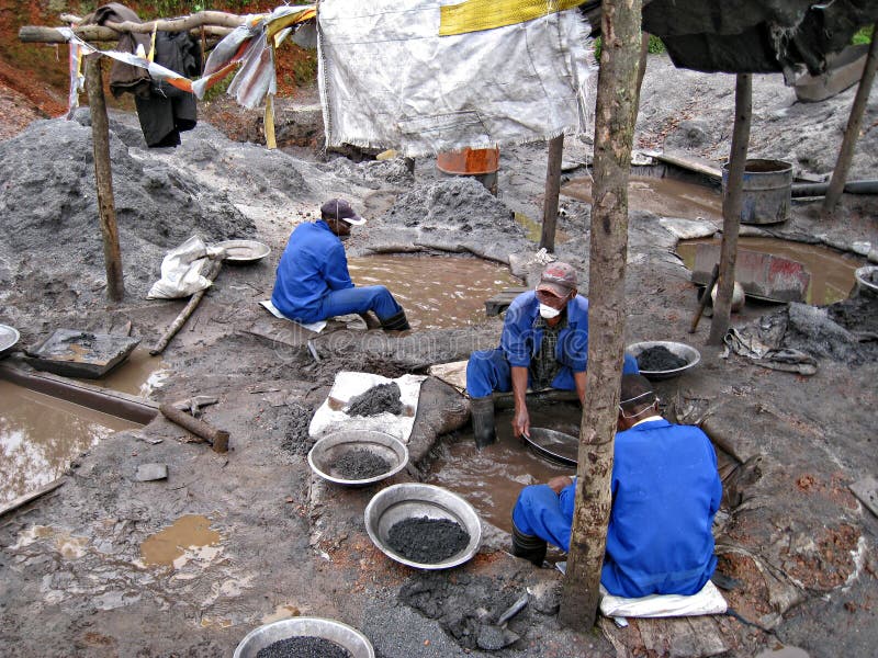 Rwandan Miners Panning For Precious Metals