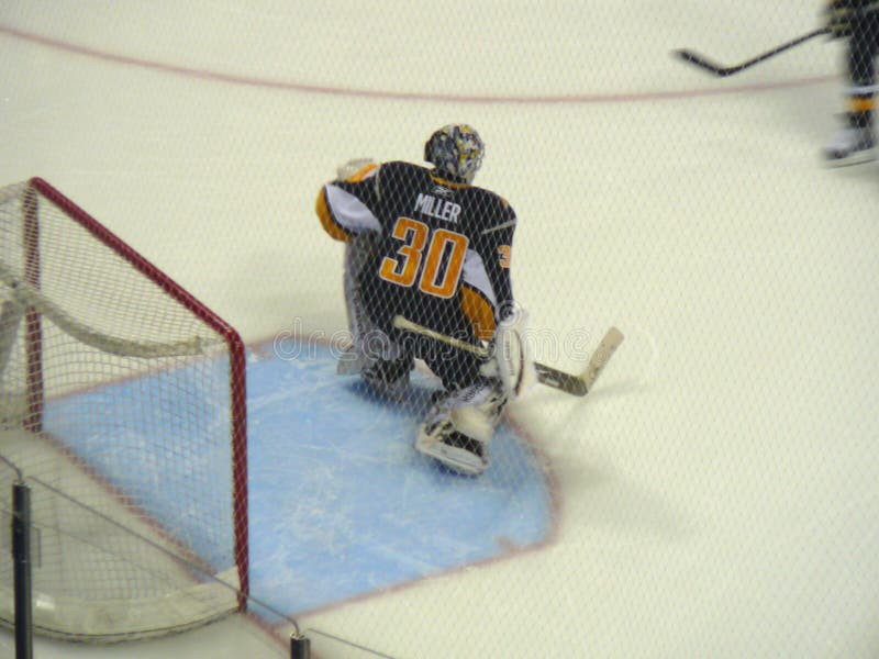 Professional hockey goalie Ryan Miller warms up on the ice before a Sabres game in Buffalo, New York. Miller played for team USA and was named the hockey tournament MVP of the 2010 Winter Olympics.
