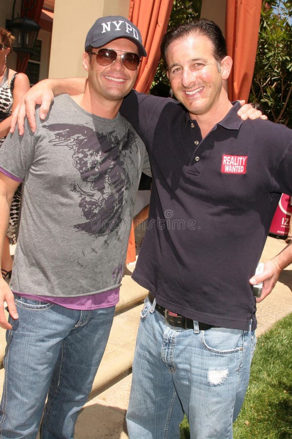 Ryan Seacrest and guest at "The Dogs Next Door" Hollywood Celebrity Benefit for DogsinDanger.com. Private Residence, Beverly Hills, CA. 06-14-08