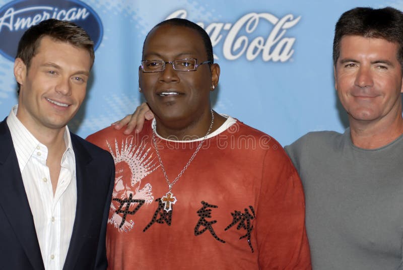 Ryan Seacrest, Randy Jackson, and Simon Cowell appearing on the red carpet for American Idol. Ryan Seacrest, Randy Jackson, and Simon Cowell appearing on the red carpet for American Idol.