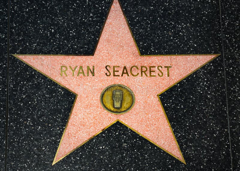 HOLLYWOOD, CA/USA - APRIL 18, 2015: Ryan Seacrest star on the Hollywood Walk of Fame. The Hollywood Walk of Fame is made up of brass stars embedded in the sidewalks on Hollywood Blvd.