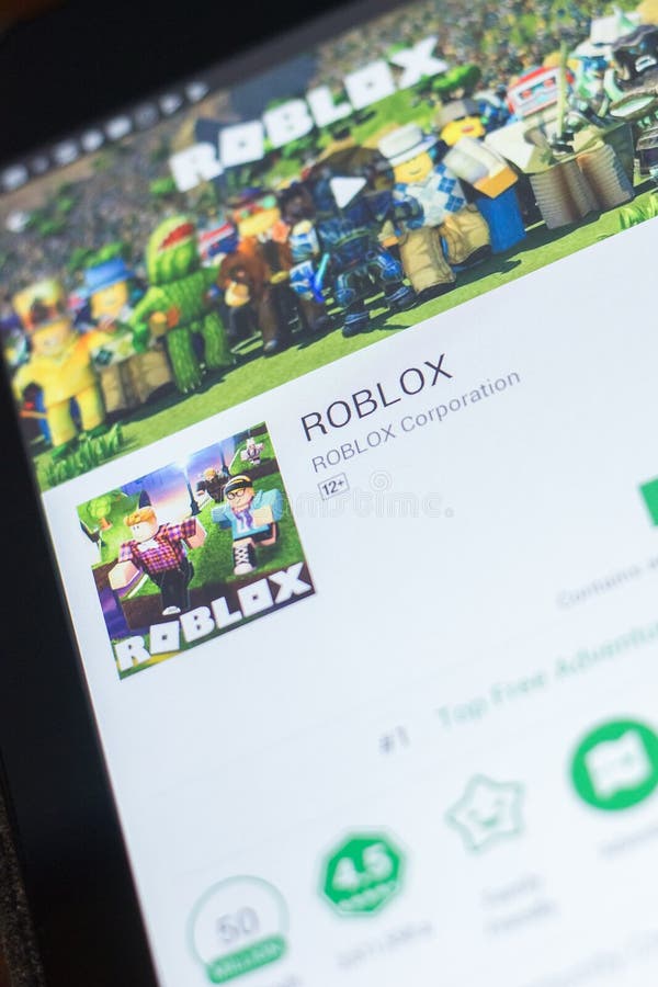 Foto Jogo Roblox na Tela do Smartphone Com Gráficos da Bolsa de Valores  Subindo [download] - Designi