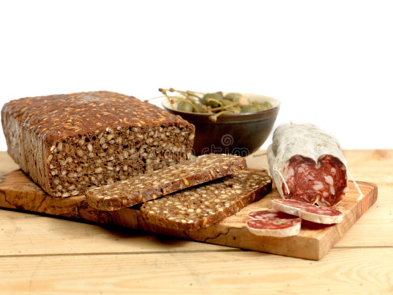 Rye bread and sausage stock image. Image of bakery, plank 50645199
