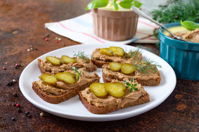 Rye Bread with Turkey Liver Pate and Pickled Cucumbers Stock Photo