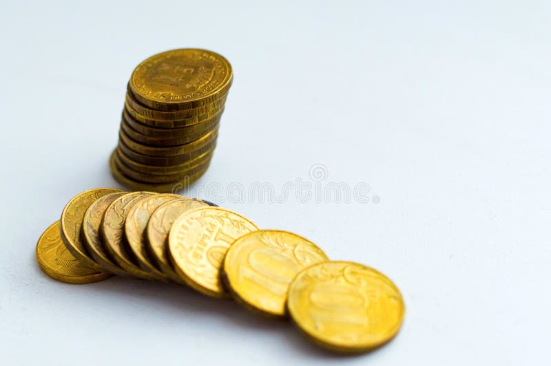 Russian ten ruble coins on white background. Russian ten ruble coins on white background.