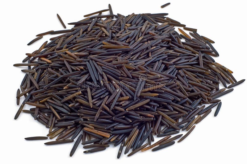 Mound of raw wild rice isolated on white background. Mound of raw wild rice isolated on white background