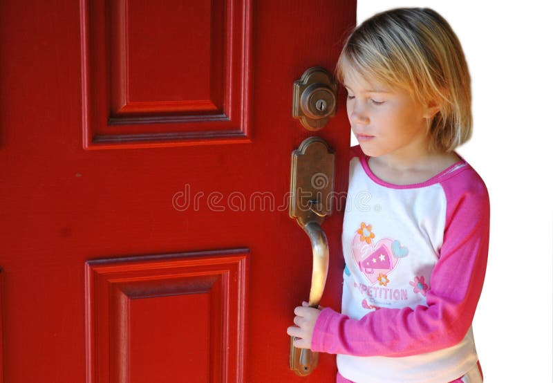 Young girl waits by the door for her parent to come home, or she is afraid to leave the house because of peer pressure. Young girl waits by the door for her parent to come home, or she is afraid to leave the house because of peer pressure.