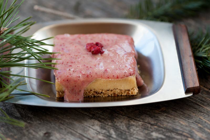 Raw cheese cake with wild strawberries. Raw cheese cake with wild strawberries